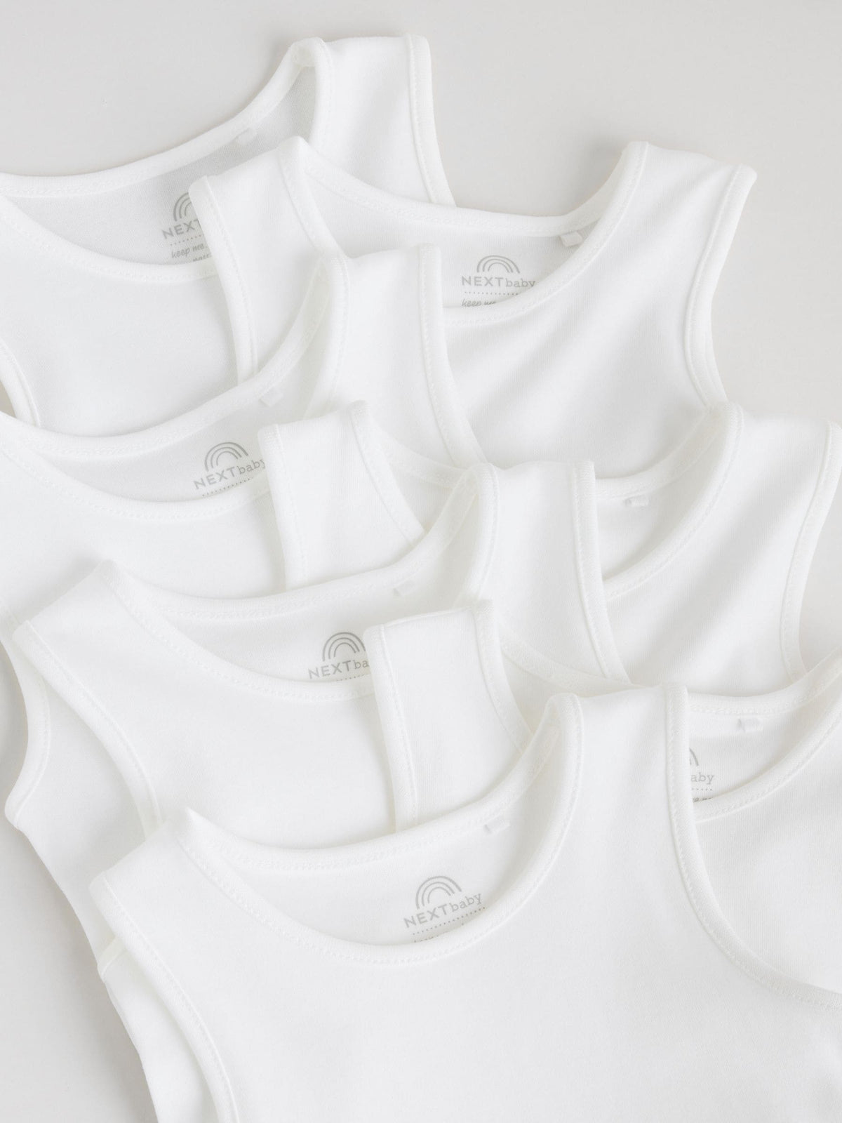 White 7 Pack Baby Vest Bodysuits