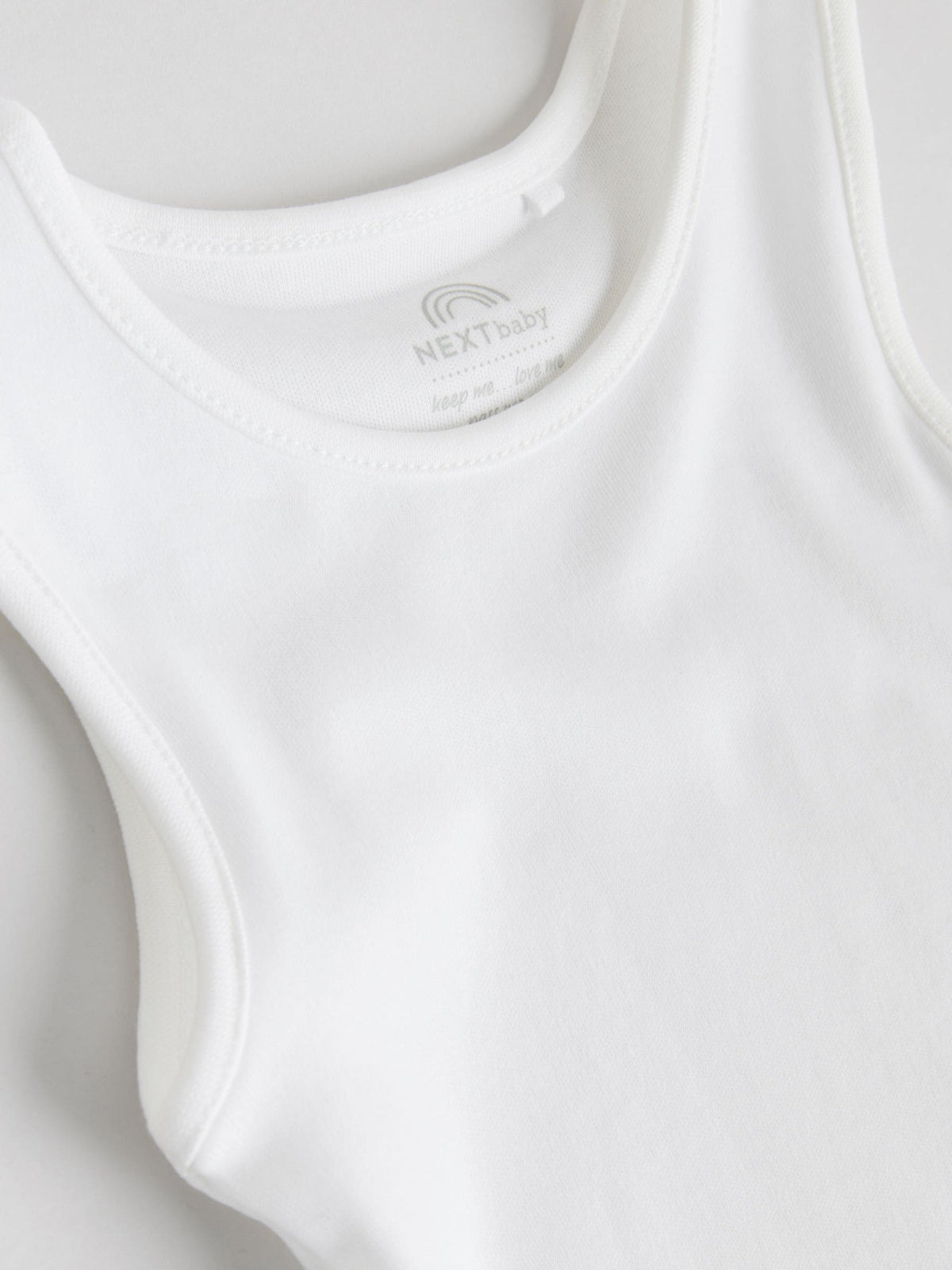 White 7 Pack Baby Vest Bodysuits