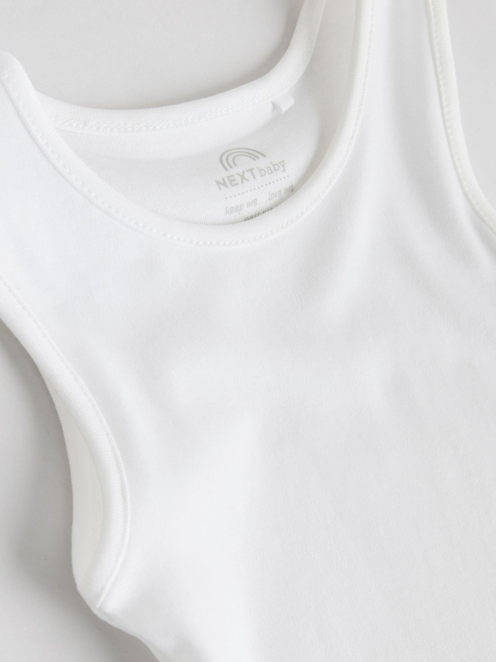 White 7 Pack Baby Vest Bodysuits