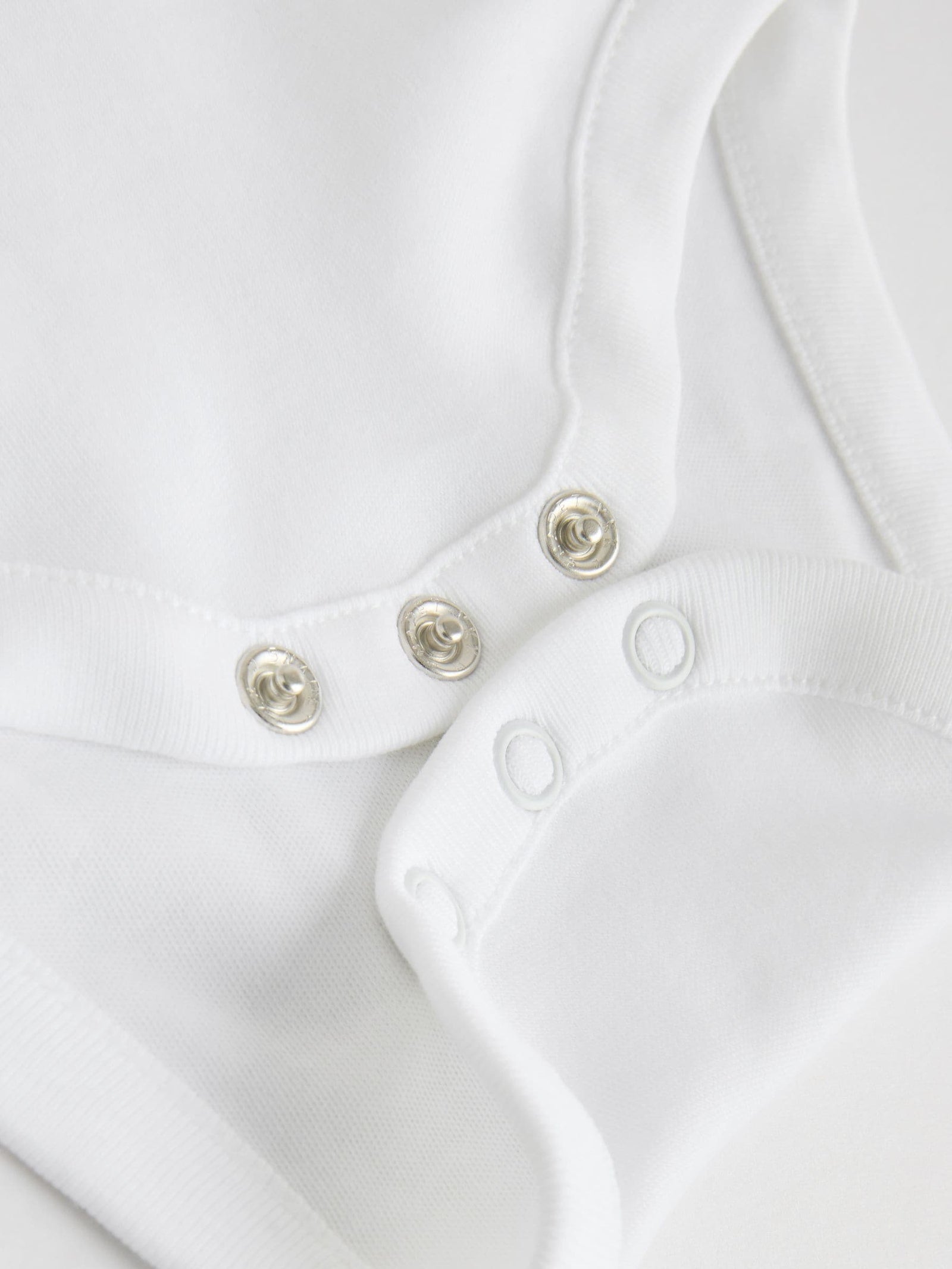 White 7 Pack Baby Vest Bodysuits