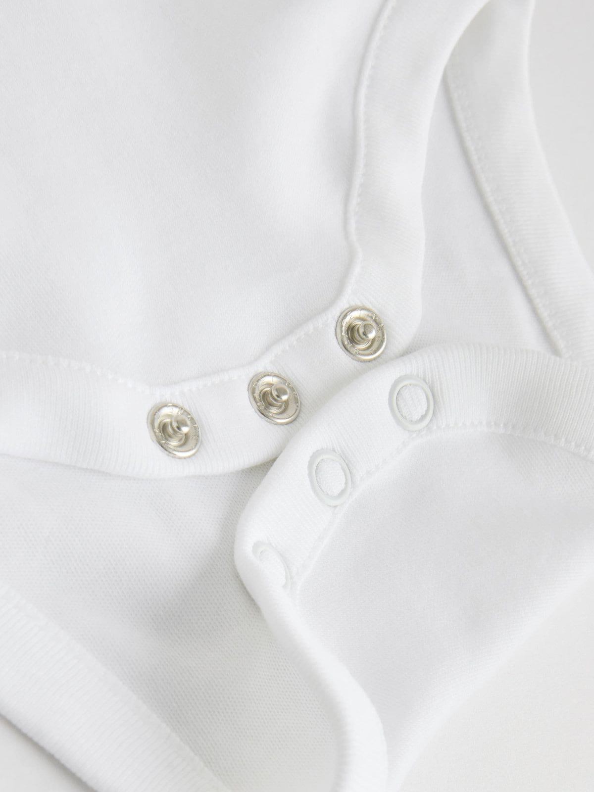 White 7 Pack Baby Vest Bodysuits