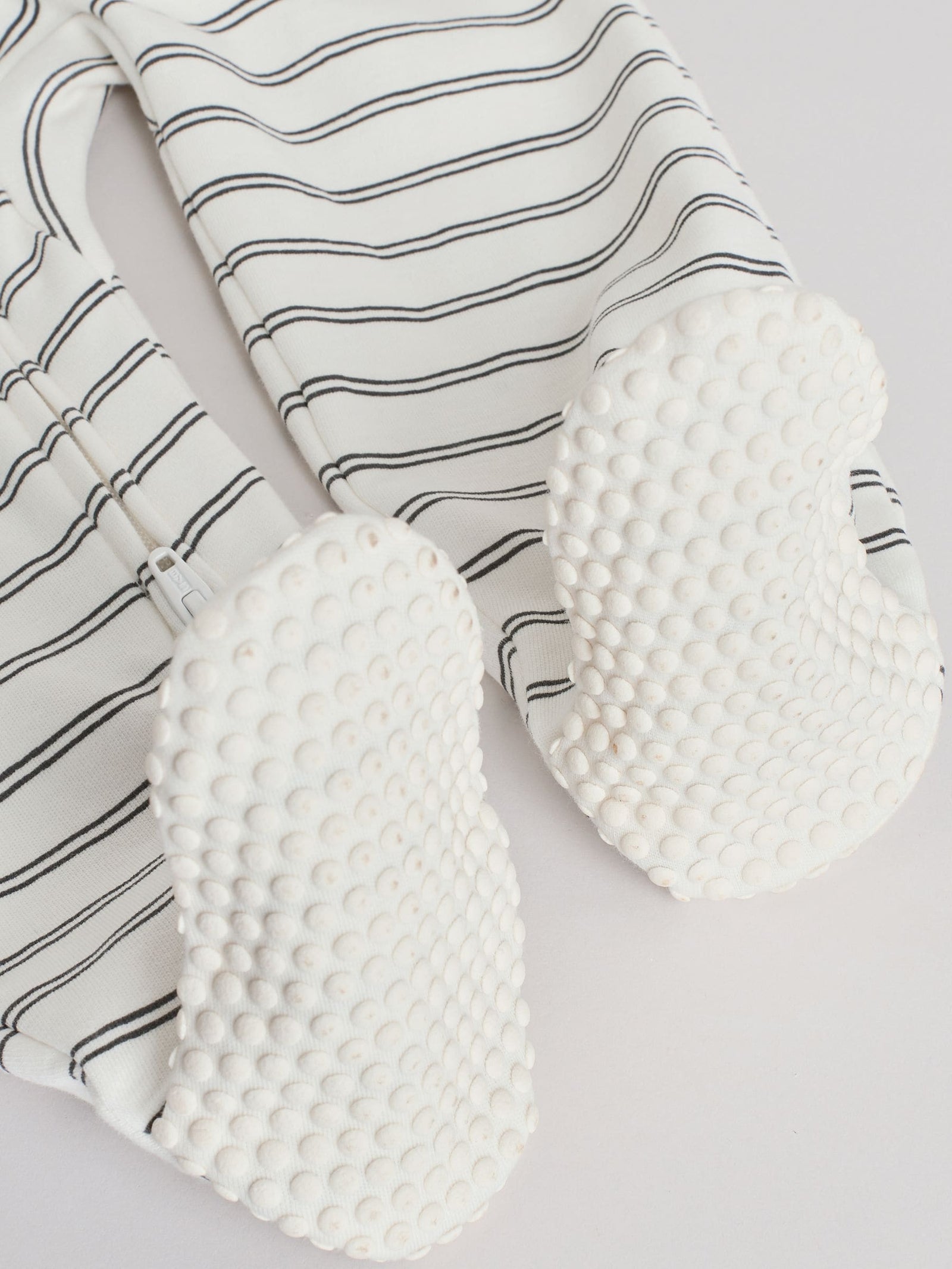 White/Black Two Way Zip Baby Sleepsuits 4 Pack