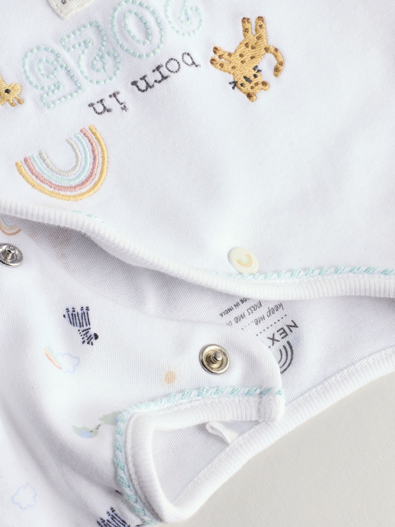White Born in 2025 Baby Sleepsuit & Hat Set