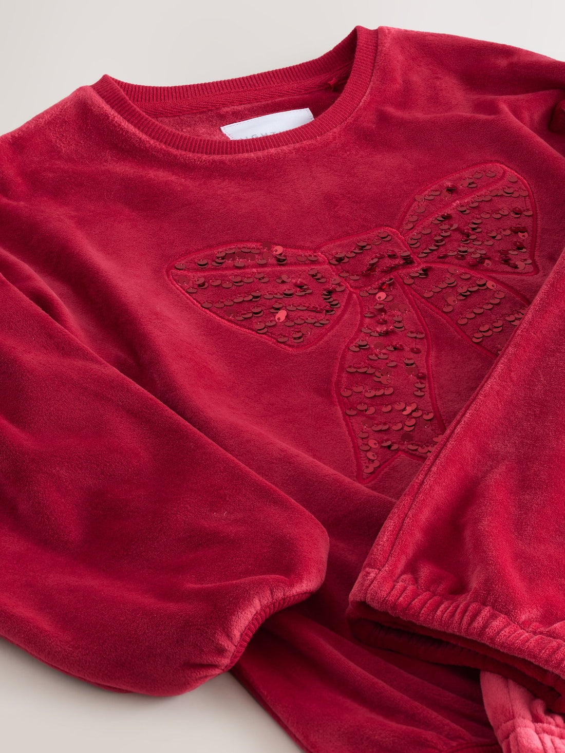 Red Sequin Bow Cosy Fleece Pyjamas