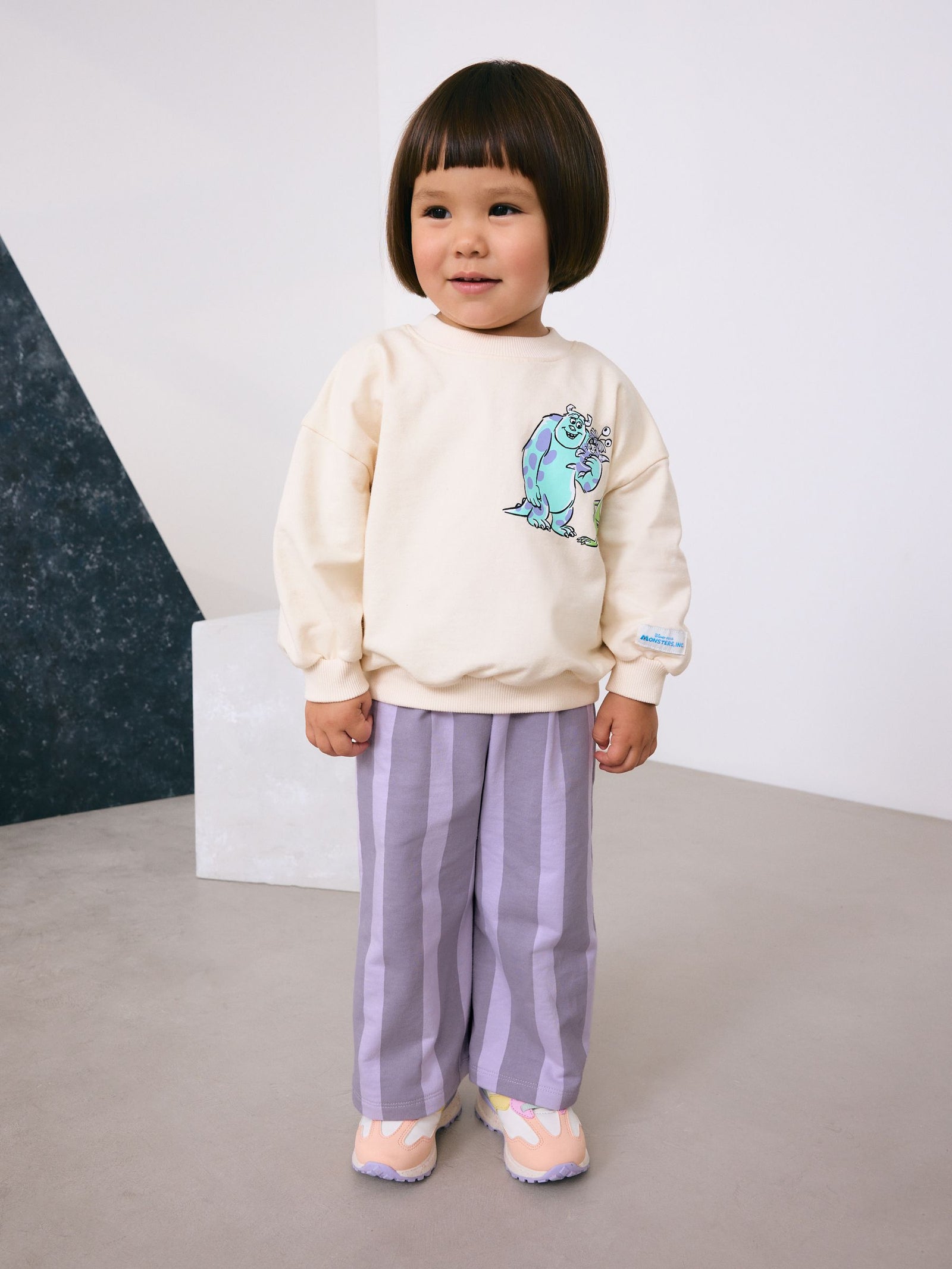 Ecru White Monsters, Inc Long Sleeve Top and Barrel Leg Trousers (3mths-7yrs)