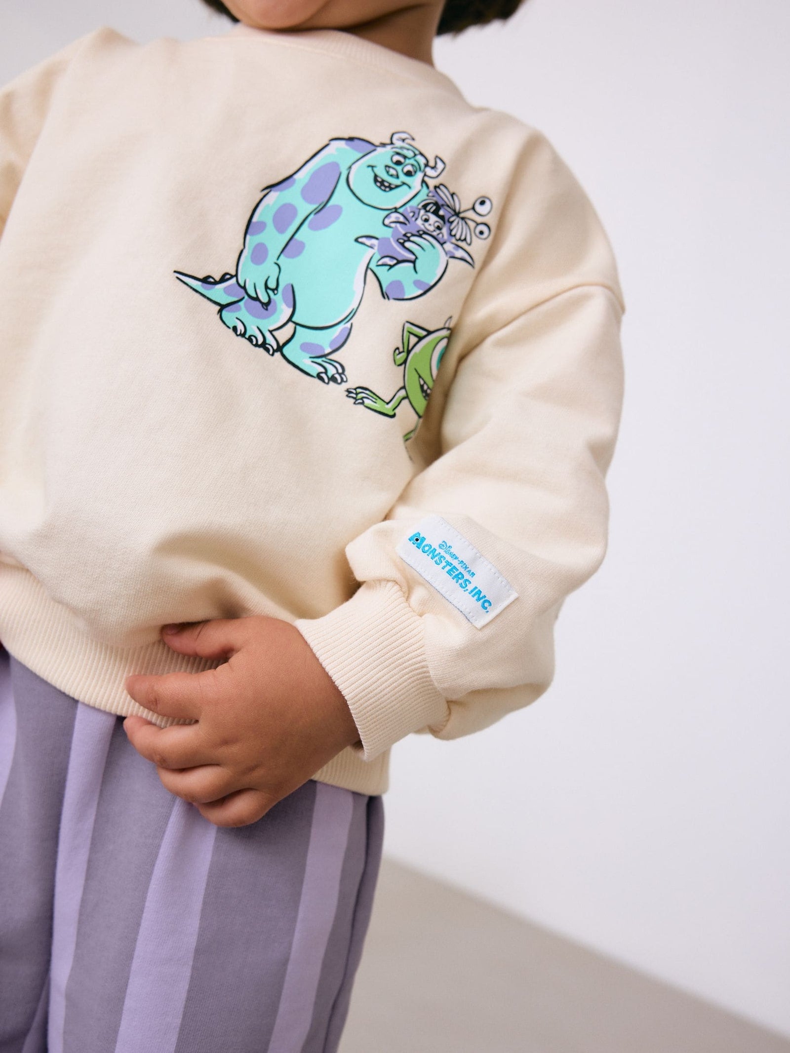 Ecru White Monsters, Inc Long Sleeve Top and Barrel Leg Trousers (3mths-7yrs)