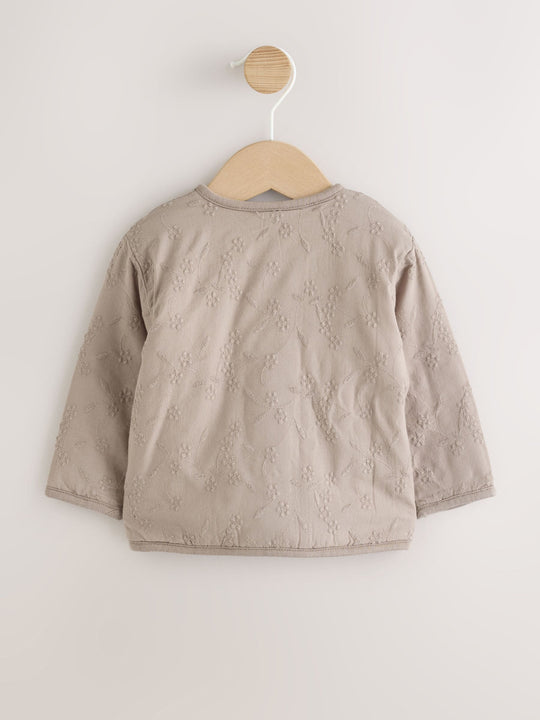 Neutral Broderie Popper Through Baby Jacket (0mths-2yrs)