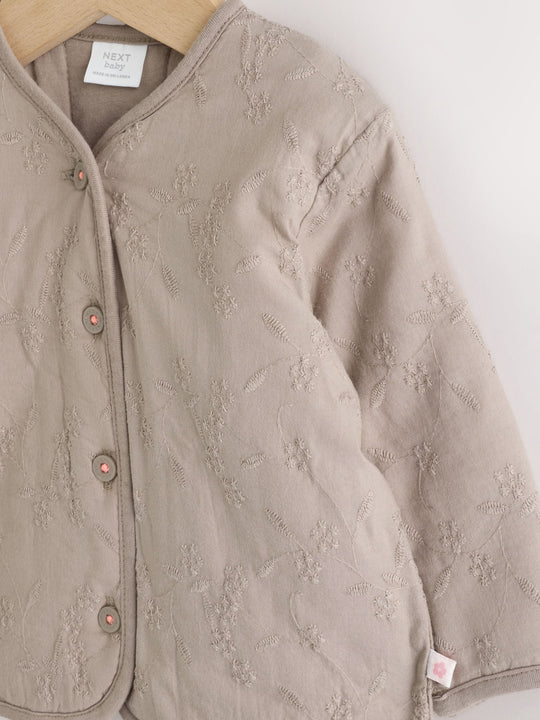 Neutral Broderie Popper Through Baby Jacket (0mths-2yrs)