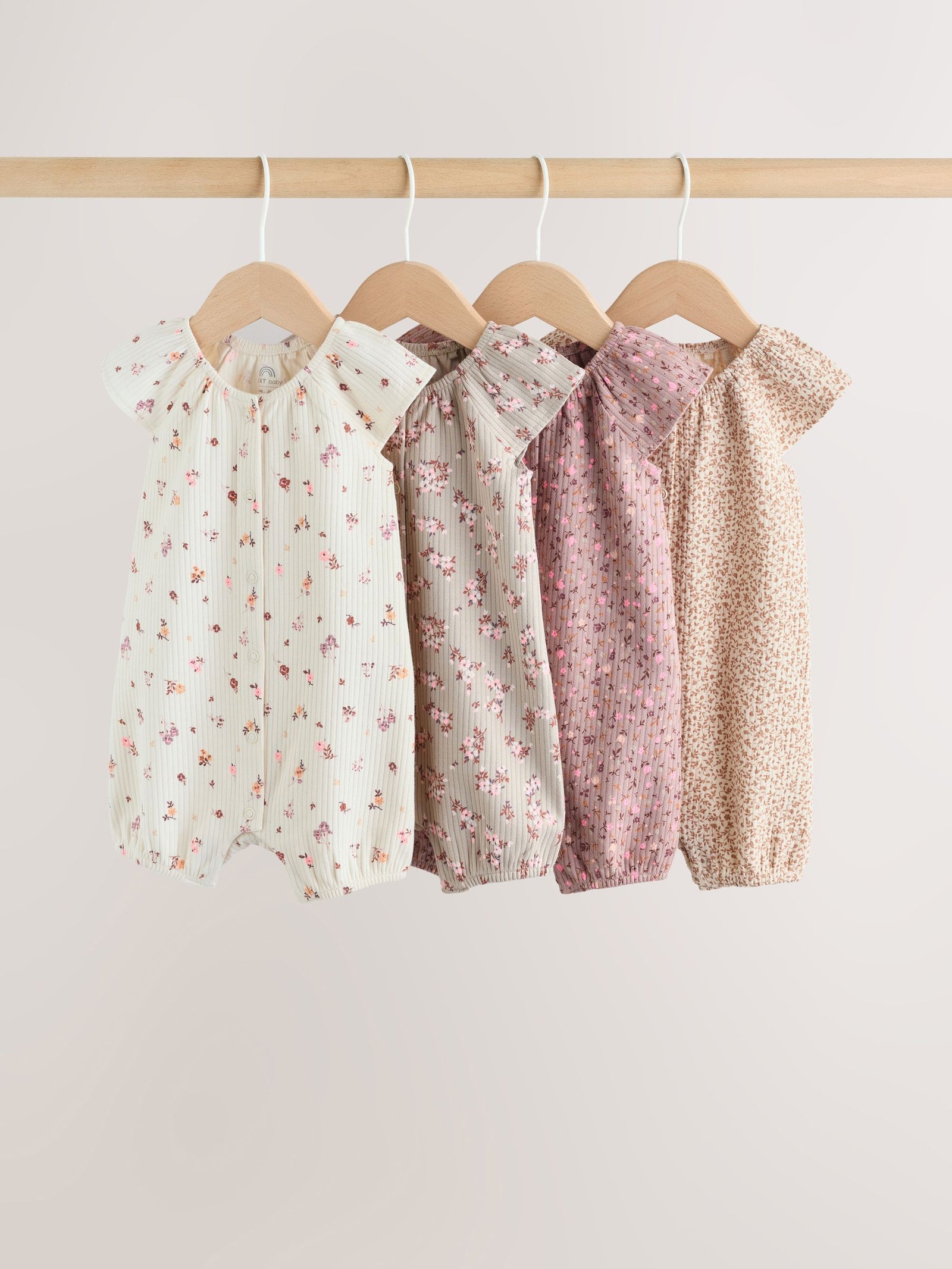 Neutral Floral Popper Through Jersey Baby Rompers 4 Pack