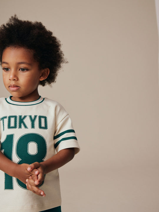 Cream Varsity Short Sleeve Graphic T-Shirt (3mths-7yrs)