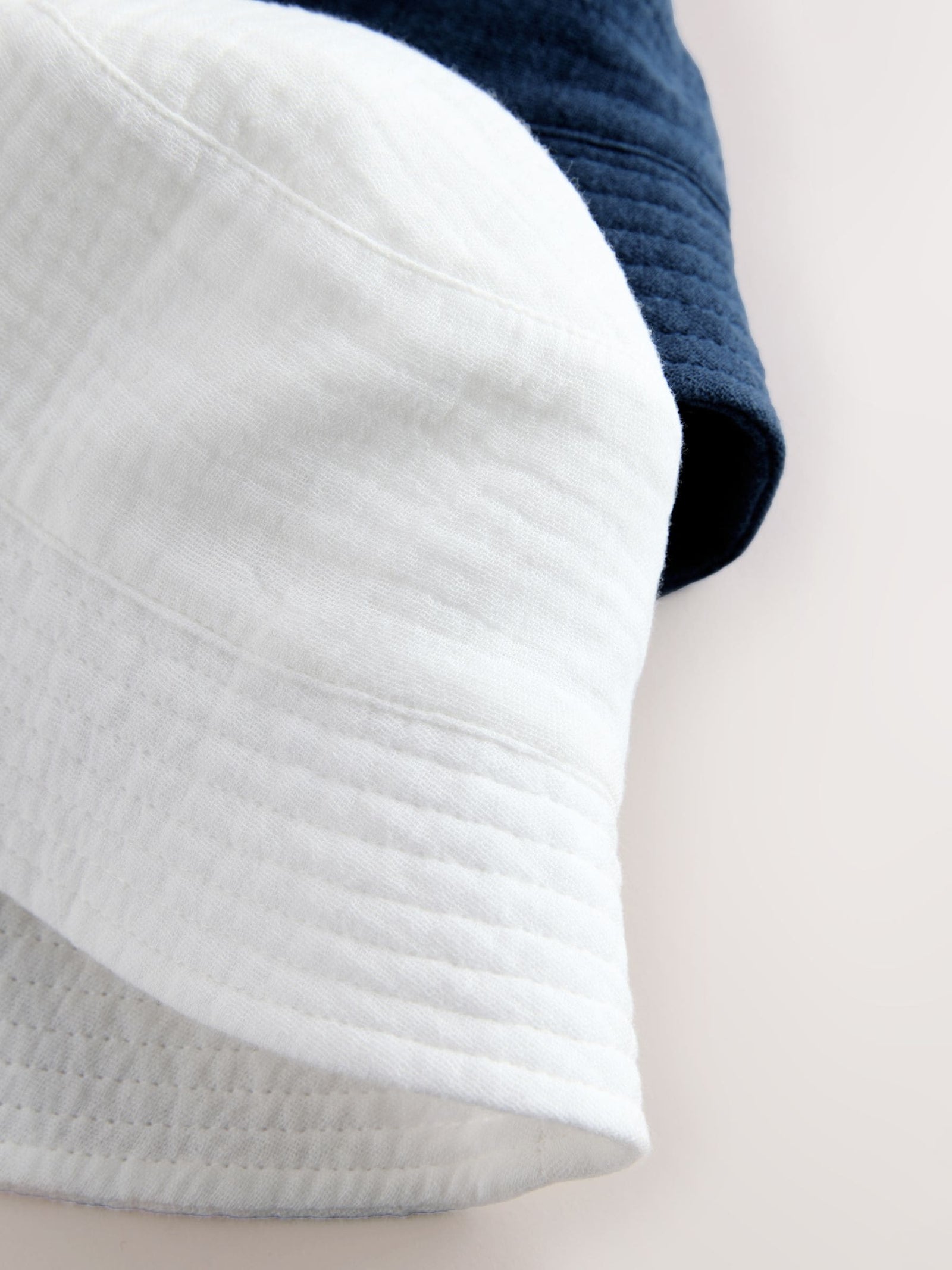 White and Blue Woven Baby Bucket Hats 2 Pack (0mths-2yrs)