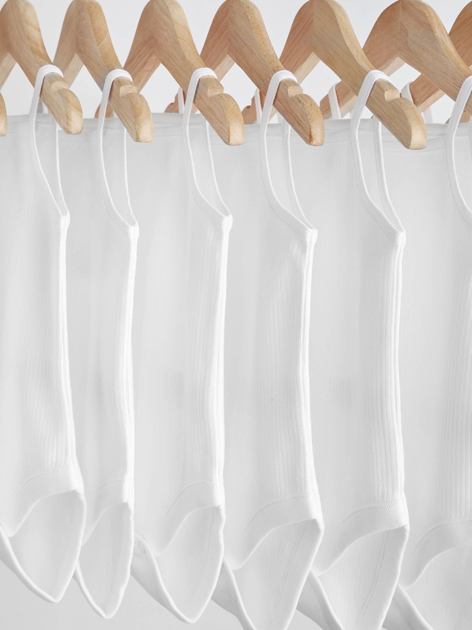 White 10 Pack Baby Strappy Bodysuits