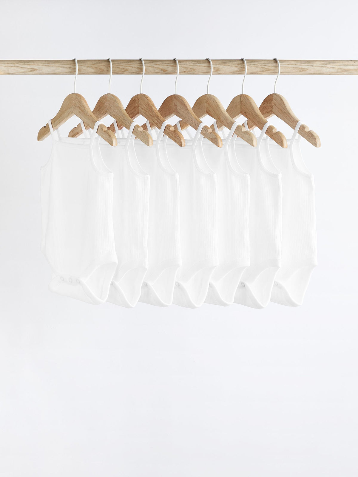 White 7 Pack Baby Strappy Bodysuits