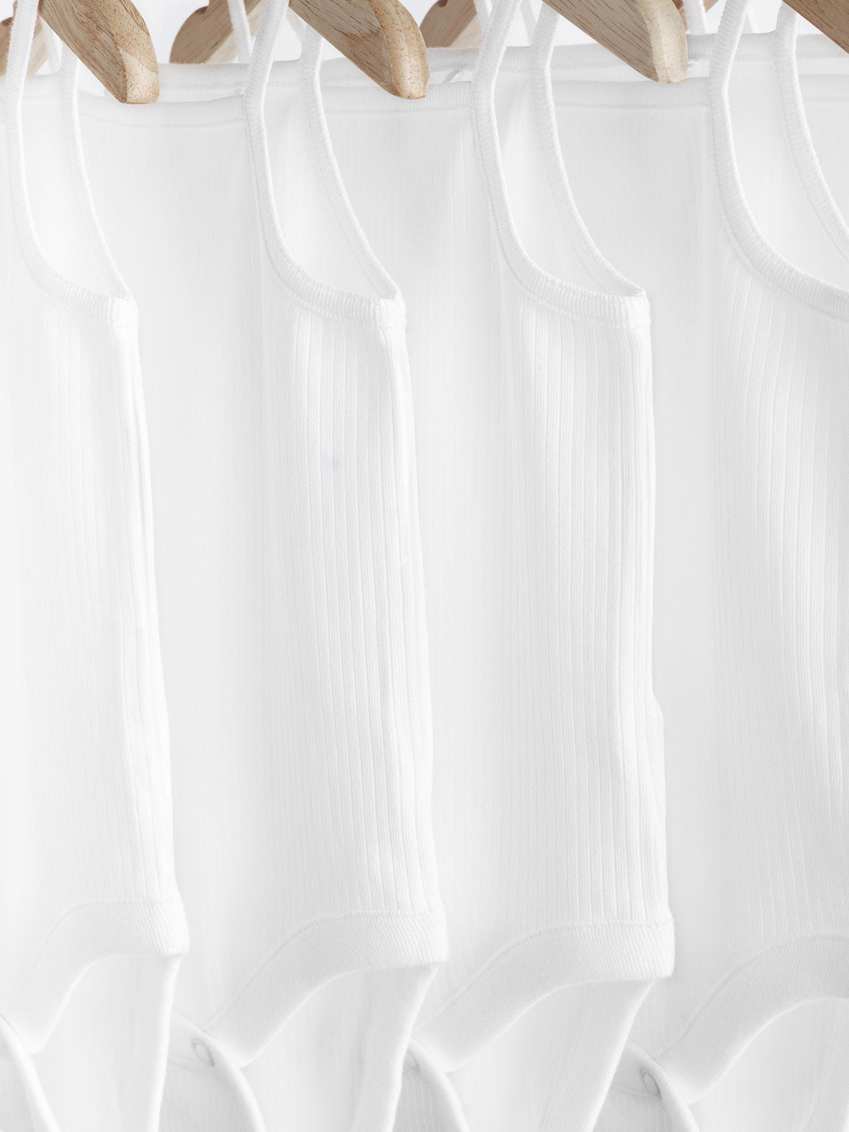 White 7 Pack Baby Strappy Bodysuits