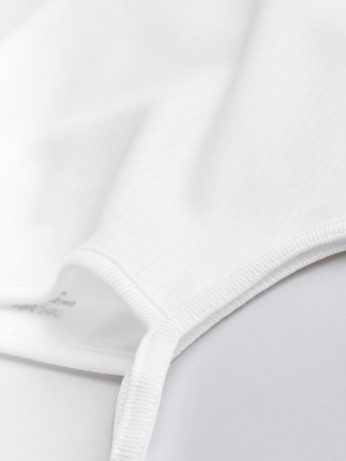 White 7 Pack Baby Strappy Bodysuits