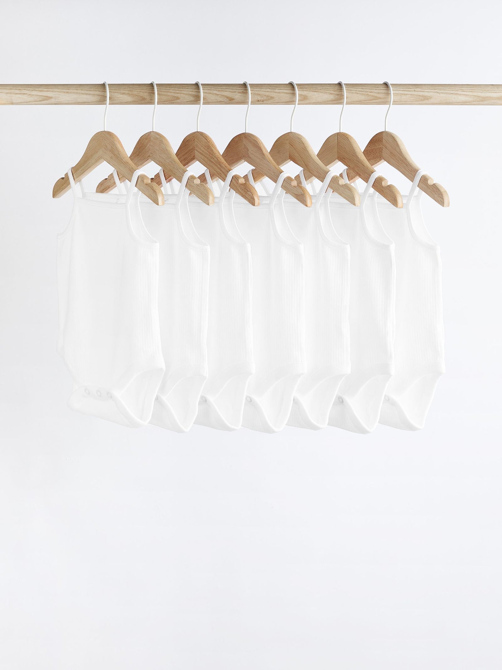 White 7 Pack Baby Strappy Bodysuits