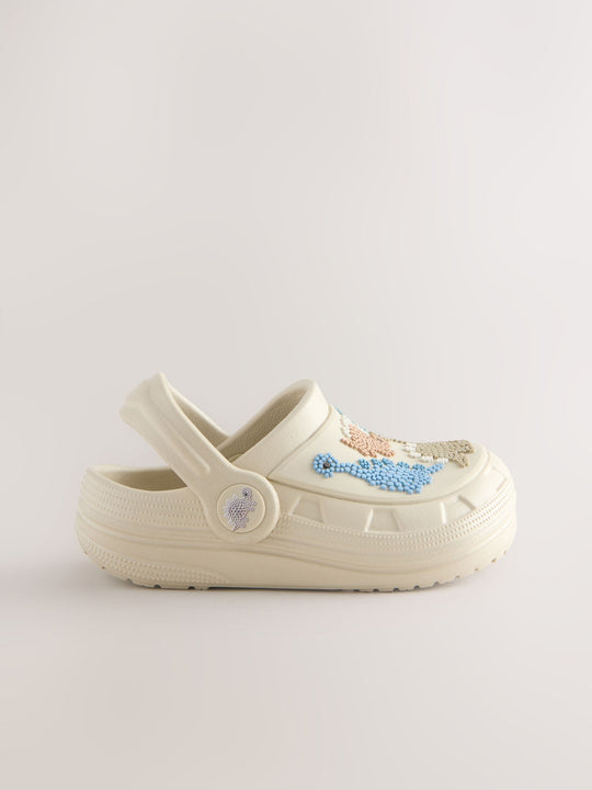 Neutral Dino Clogs