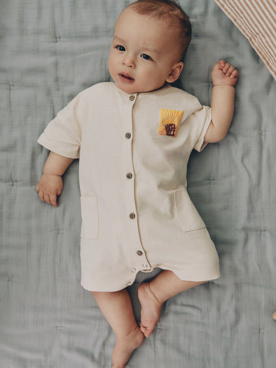Neutral Sunshine Rebecca Zwanzig Seminal Printed Button Through Baby Romper