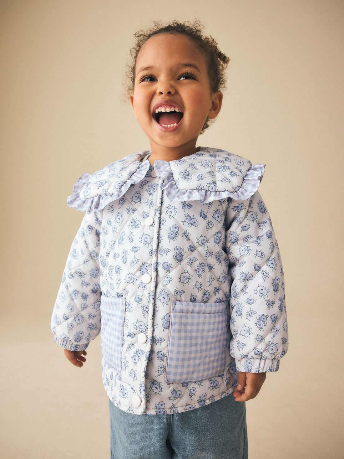 Blue/White Shower Resistant Frill Collar Quilted Jacket (3mths-7yrs)