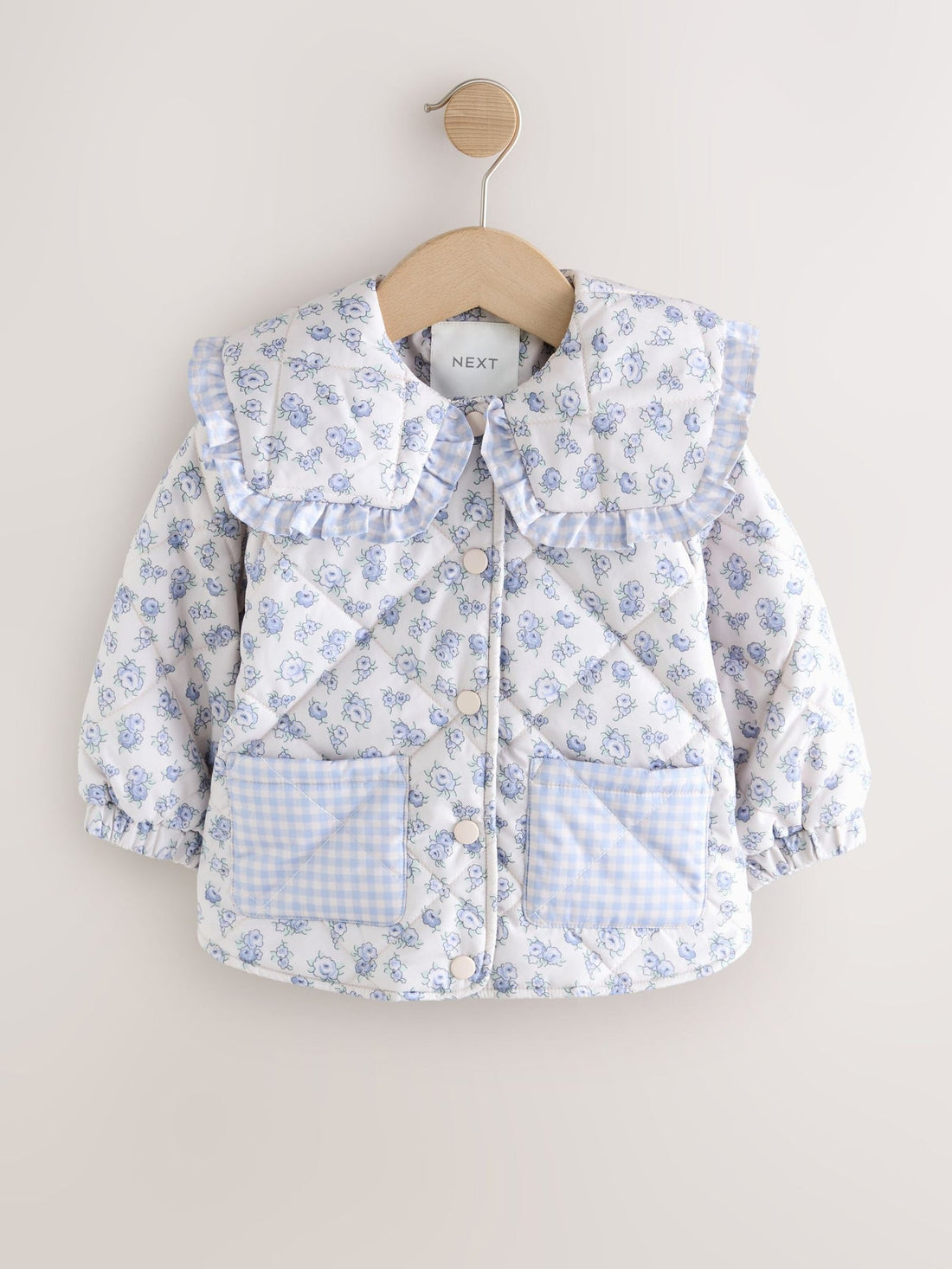 Blue/White Shower Resistant Frill Collar Quilted Jacket (3mths-7yrs)