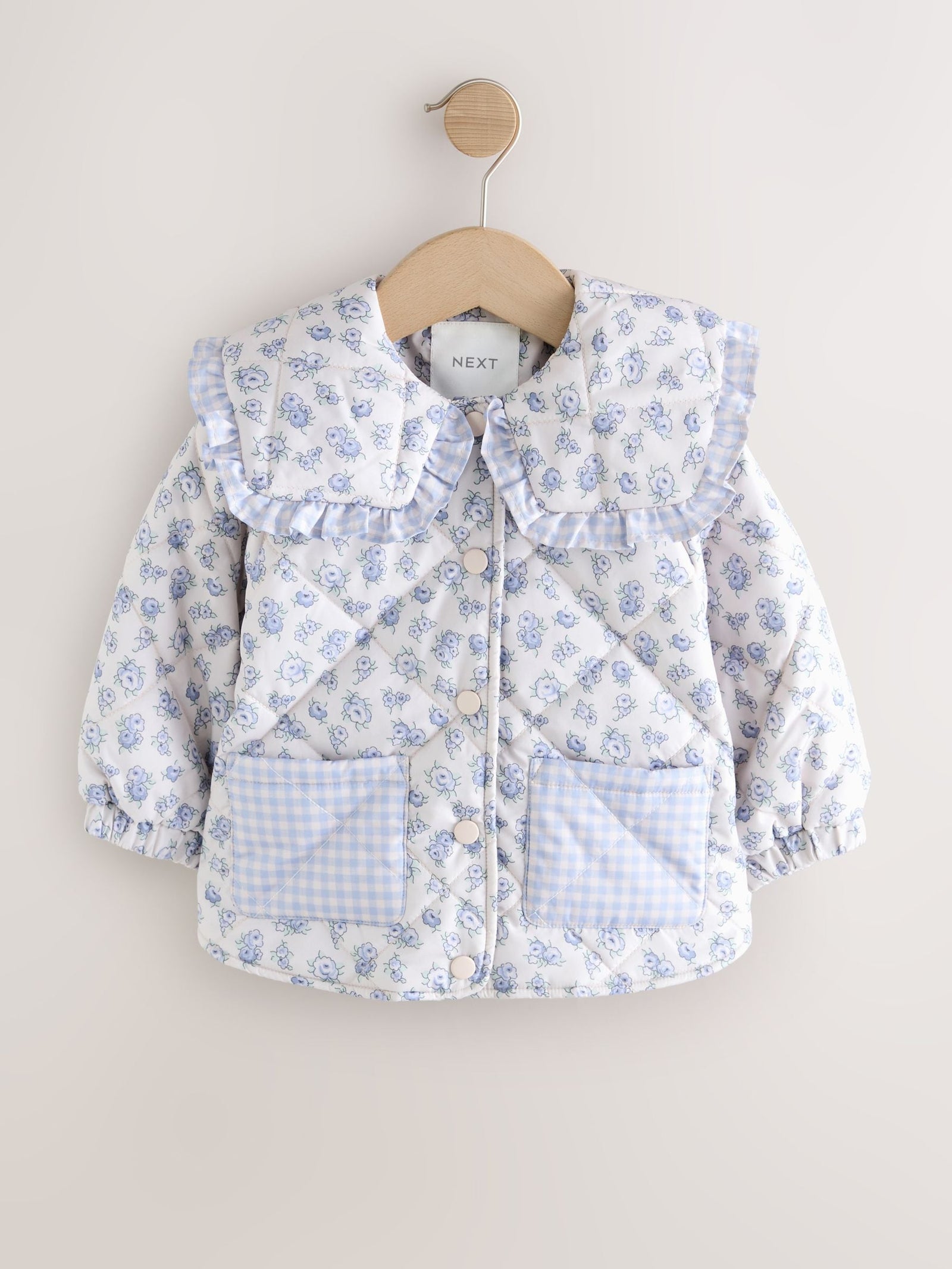 Blue/White Shower Resistant Frill Collar Quilted Jacket (3mths-7yrs)