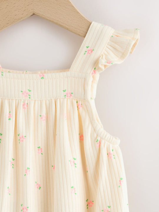 White Floral Baby Long Leg Jersey Romper (0mths-3yrs)